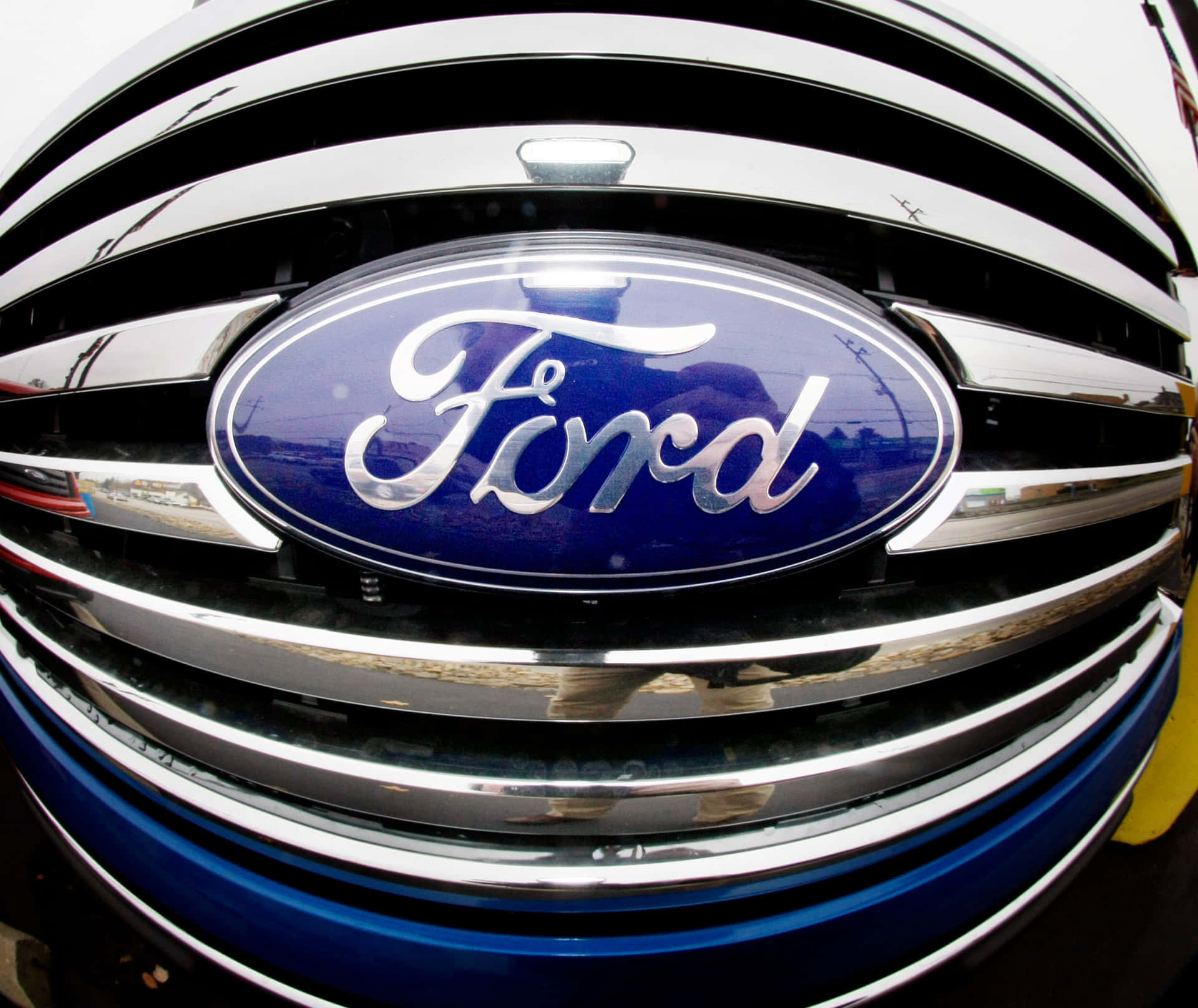 Ford Logo - A symbol of automotive excellence Wallpaper