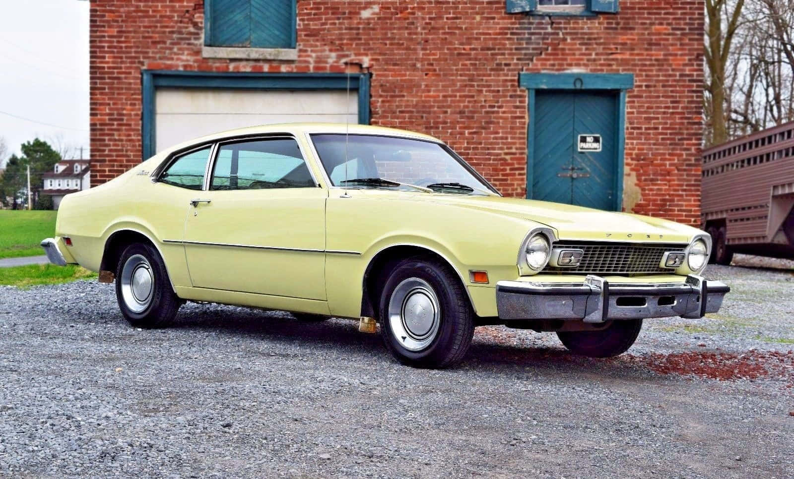 Sleek Ford Maverick in Stunning Scenery Wallpaper