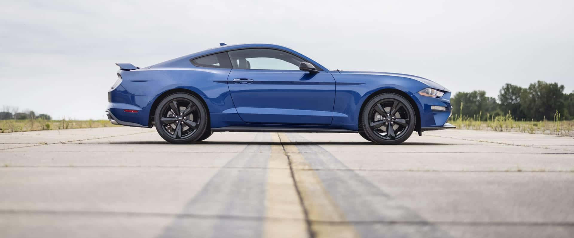 Stunning Ford Mustang California Special cruising down the road Wallpaper