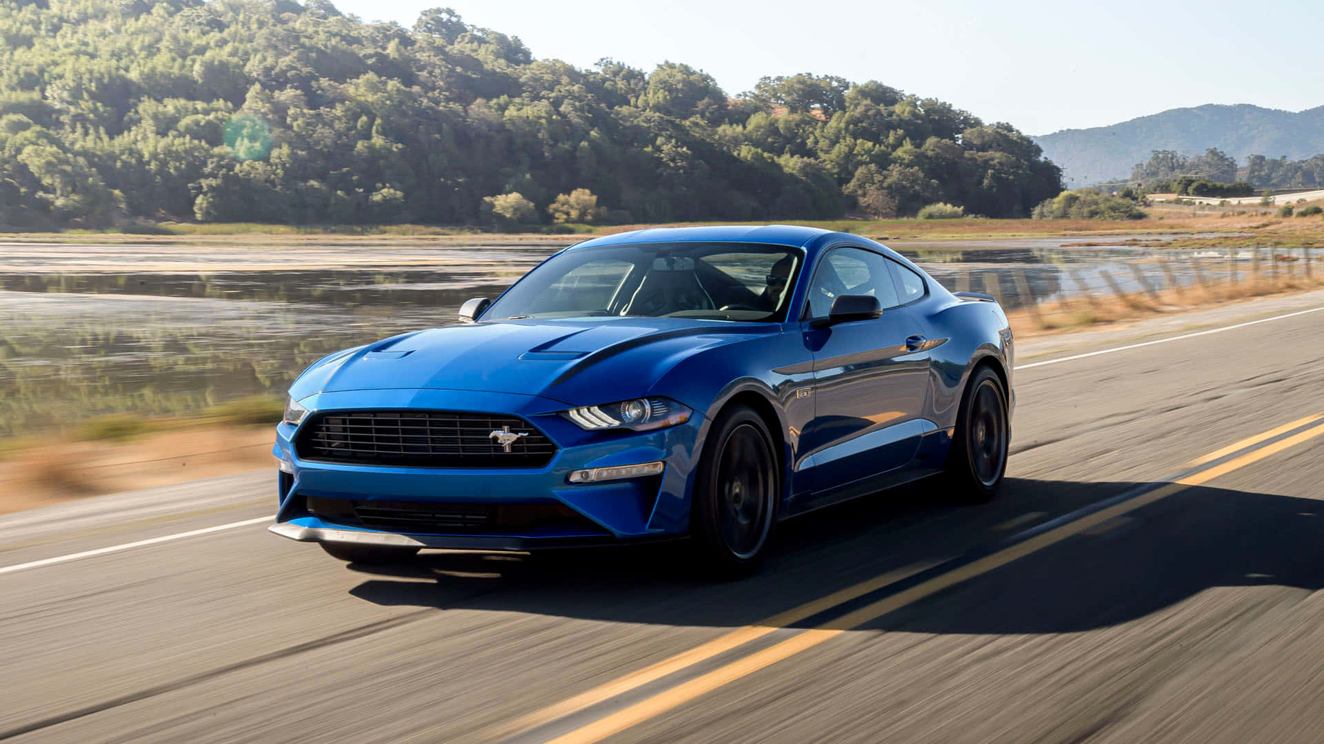 Sleek Ford Mustang Ecoboost on the road Wallpaper