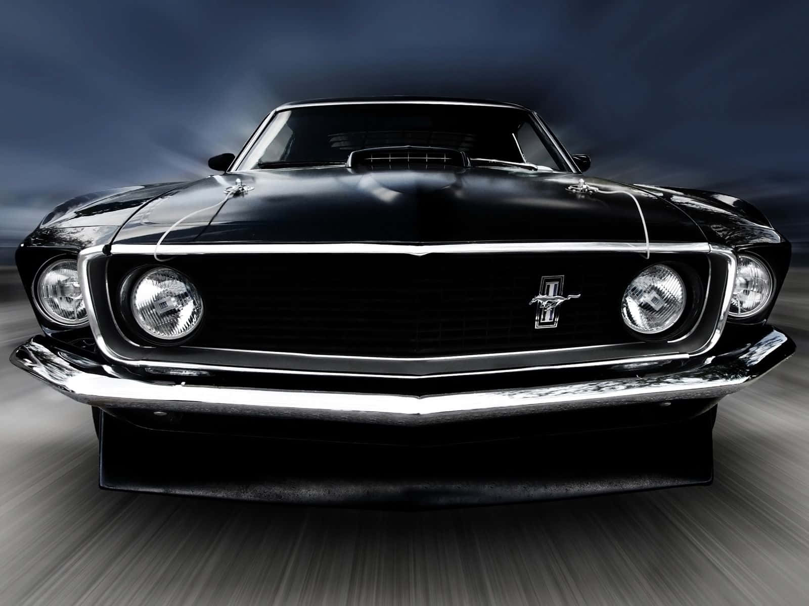 Iconic Ford Mustang Mach 1 in Action Wallpaper