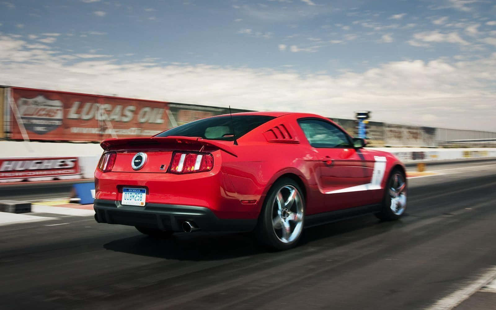 Powerful Ford Mustang Roush in Action Wallpaper