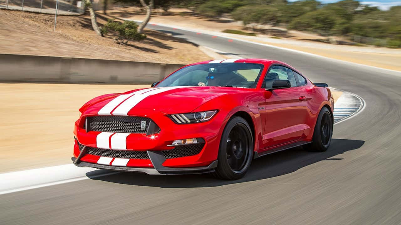 Sleek Ford Mustang Shelby GT350 in Action Wallpaper