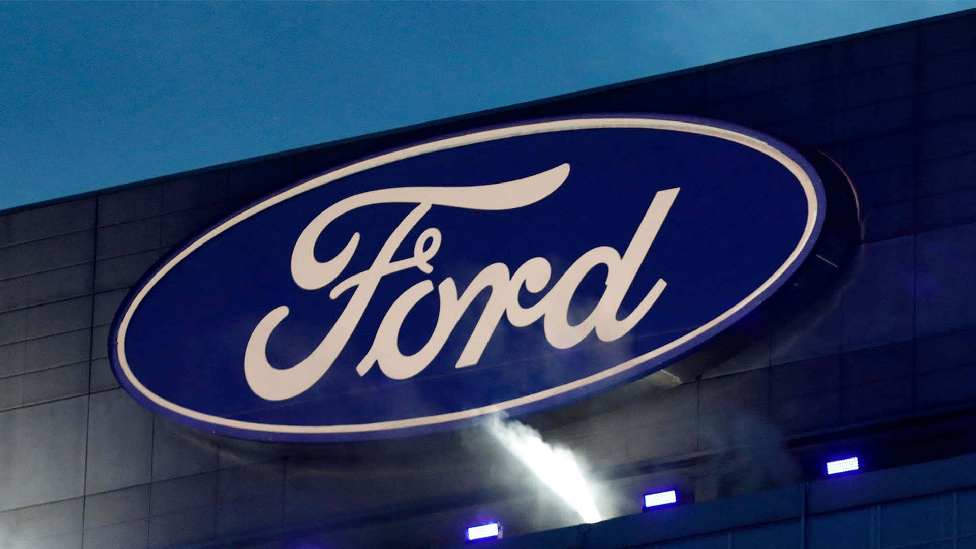 Ford Logo On A Building At Night
