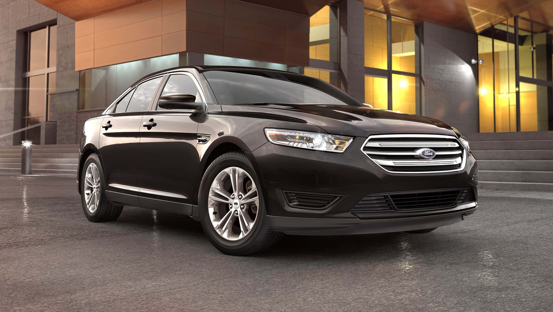 The Black 2019 Ford Taurus Is Parked In Front Of A Building