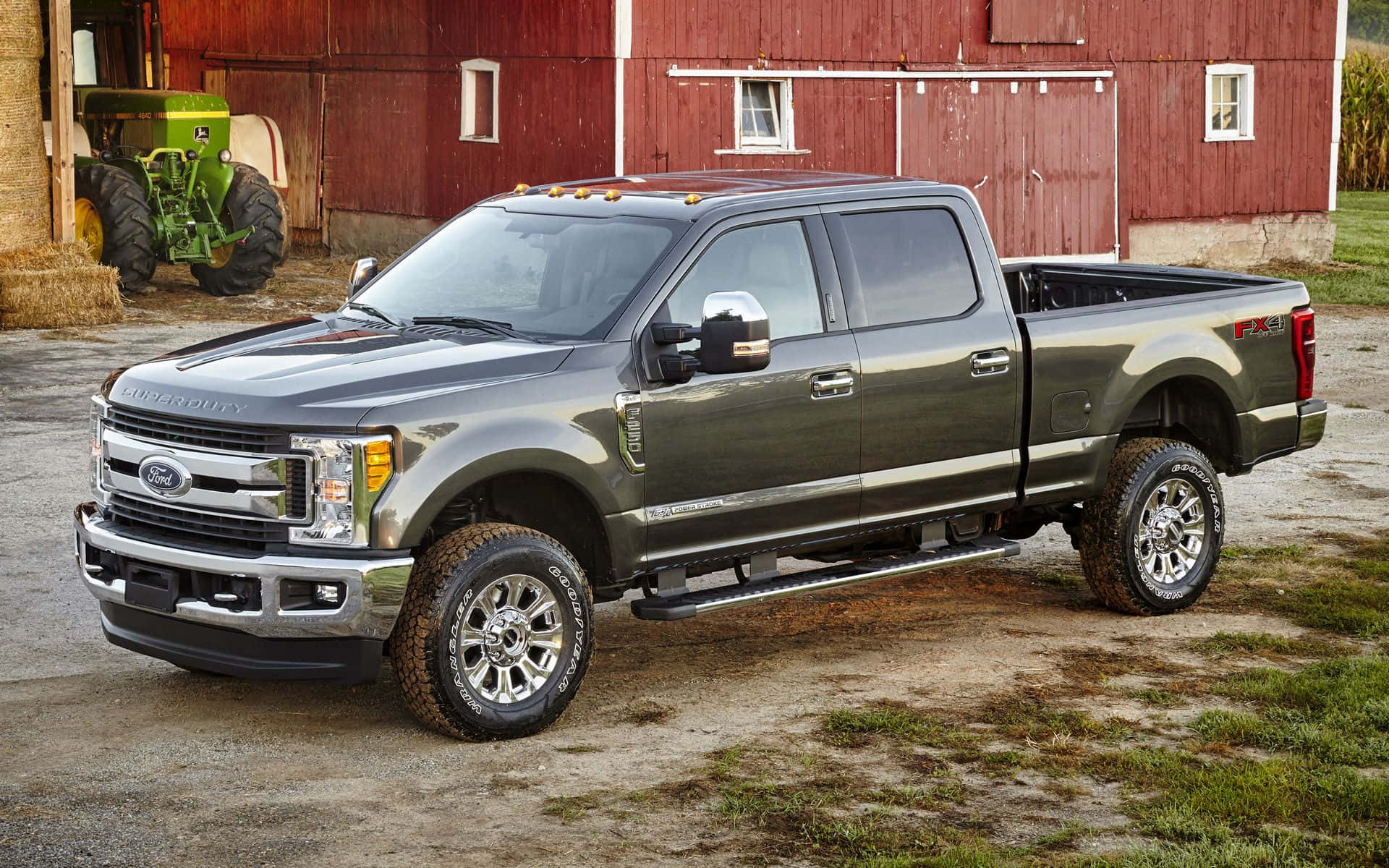 The 2018 Ford Super Duty F-250 Is Parked In Front Of A Barn Wallpaper