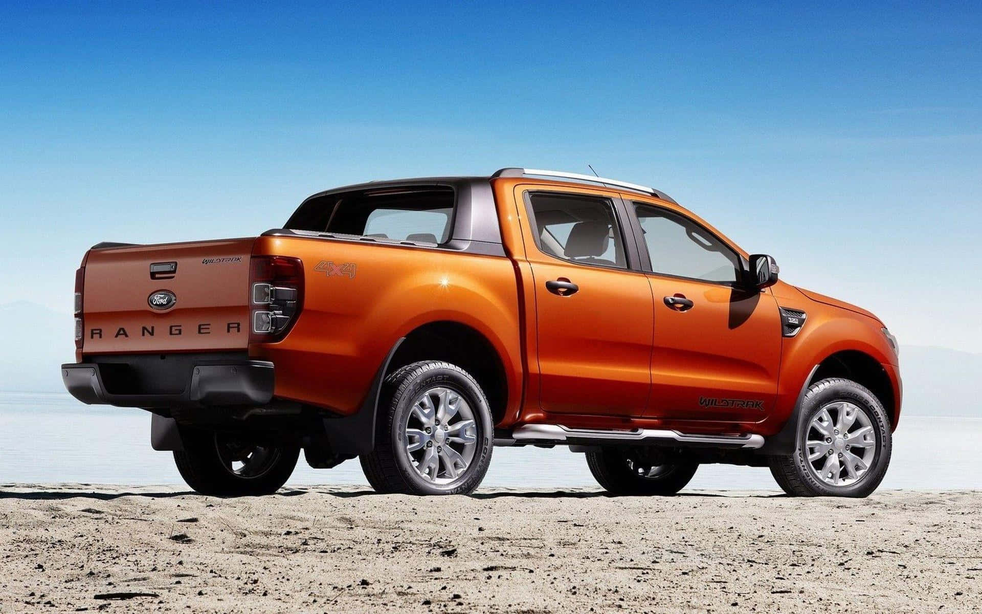 Caption: Powerful Ford Ranger on a Scenic Adventure Wallpaper