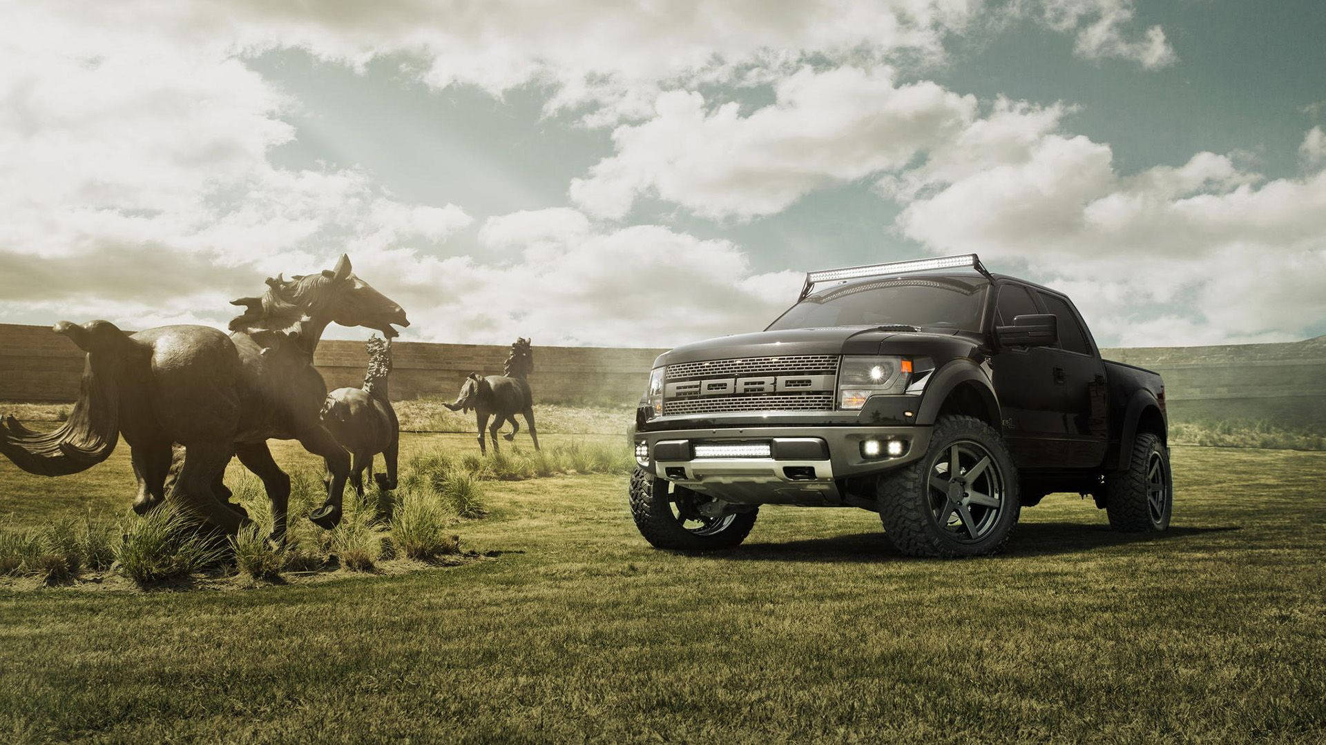 Ford Raptor And Horse Statues Background