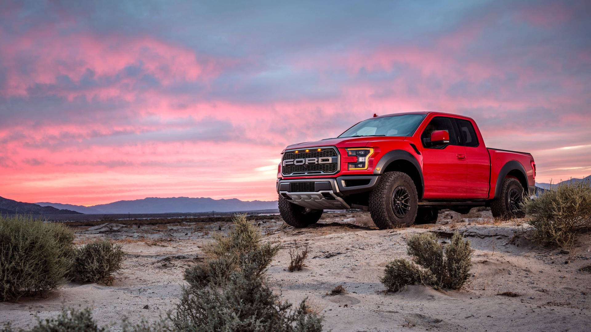 Ford Raptor In Red Color Background