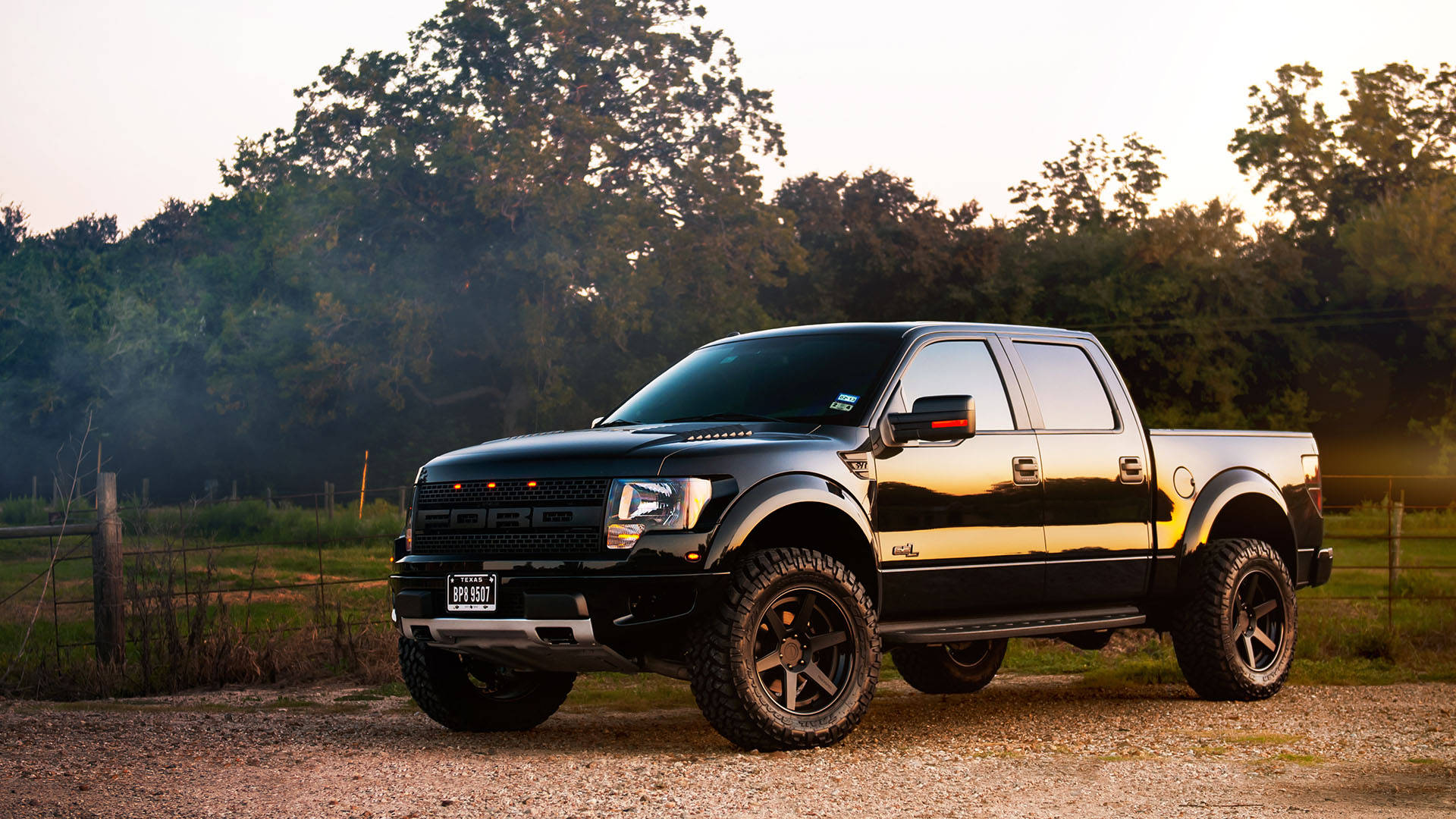Ford Raptor In Shiny Black Paint Wallpaper