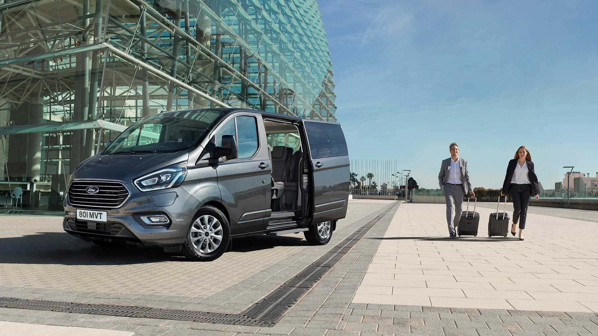 Sleek Ford Transit parked in urban setting Wallpaper