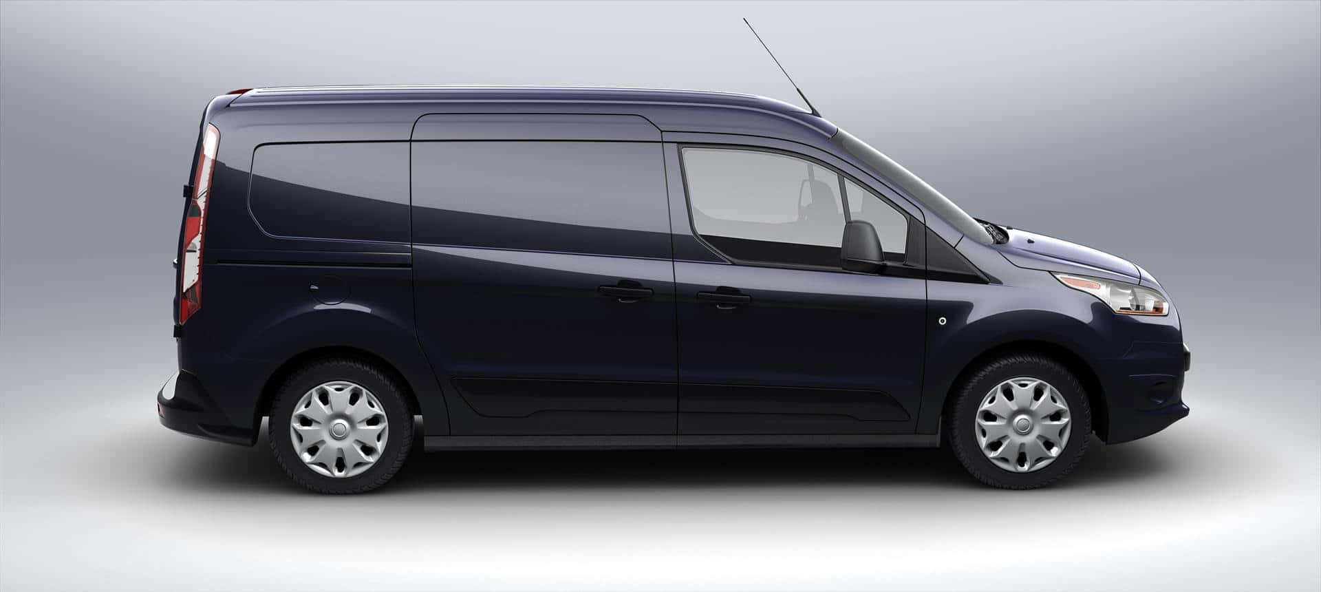 Sleek and Modern Ford Transit on the Road Wallpaper