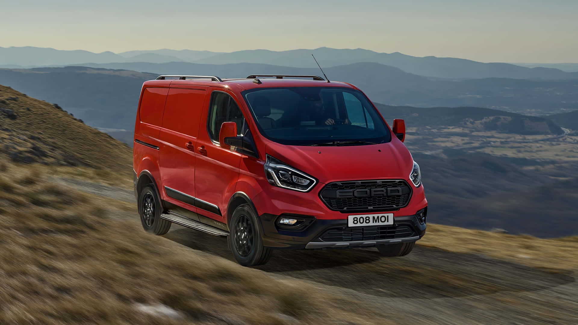 Sleek and Stylish Ford Transit on the Road Wallpaper