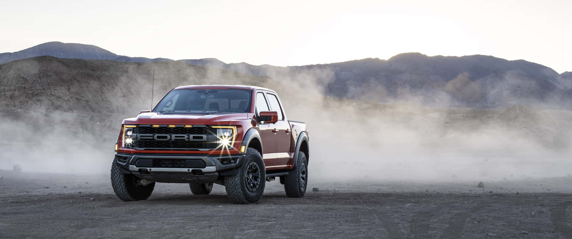 The 2020 Ford F-150 Raptor Is Driving Through The Desert Wallpaper
