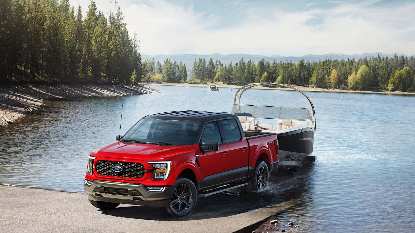 The Red 2020 Ford F-150 Is Parked On A Boat In A Lake