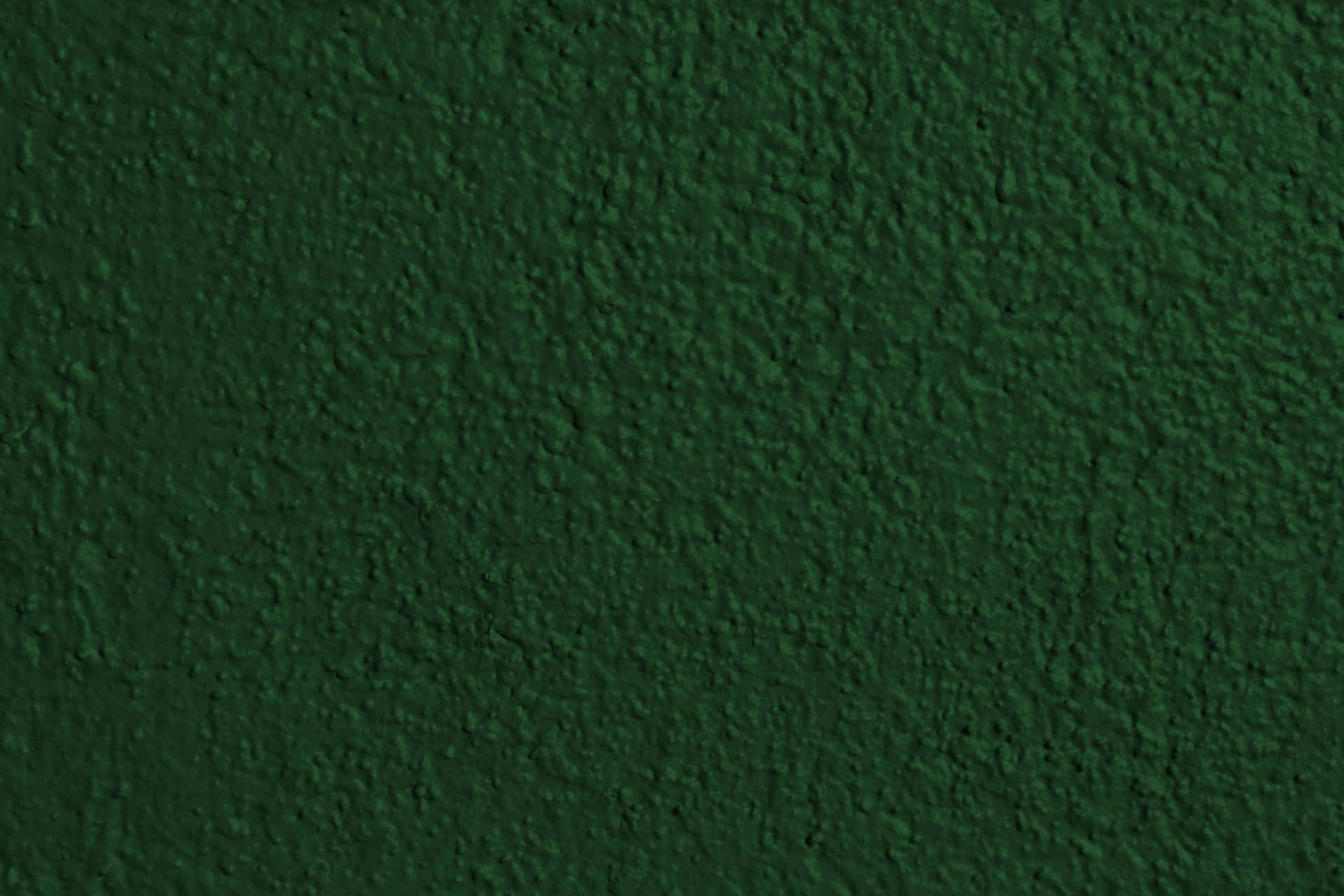 The Serene Beauty of a Forest Green Meadow Wallpaper