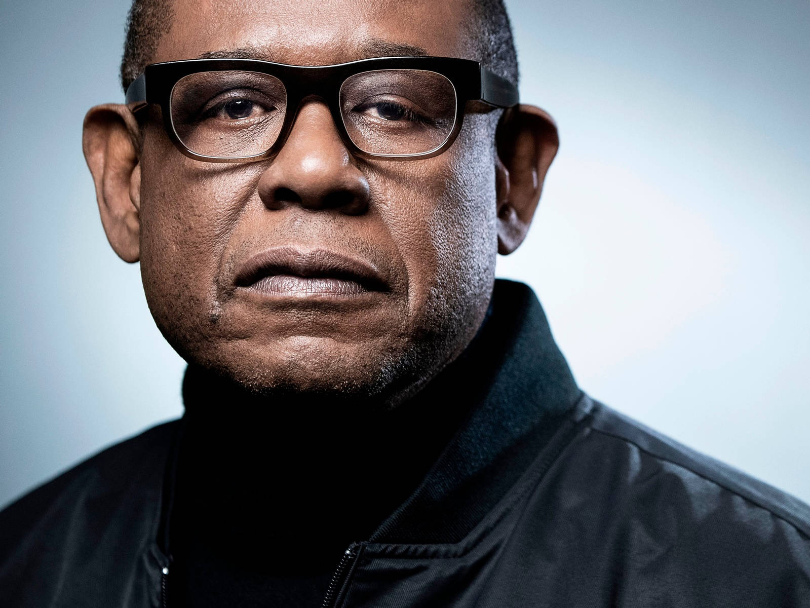 Award-winning actor Forest Whitaker in a professional setting Wallpaper