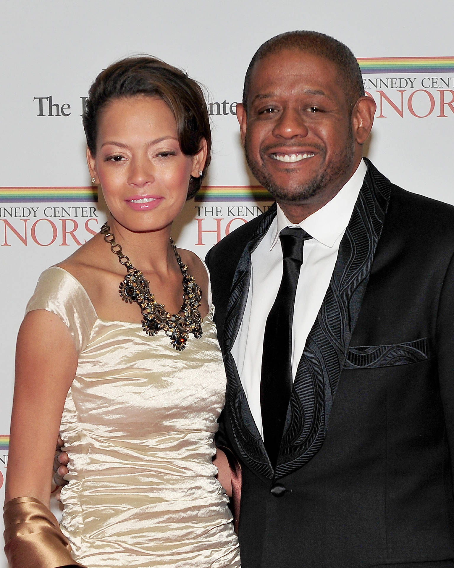 Hollywood Star Forest Whitaker alongside wife Keisha Nash at a public event. Wallpaper