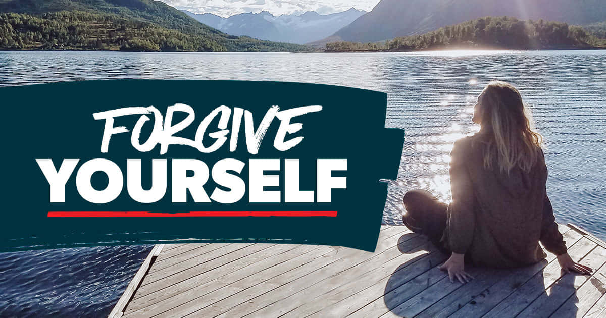 Forgive Yourself - A Woman Sitting On A Dock With A Lake