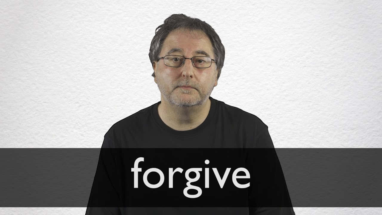 Forgiveness - A Man In Front Of A White Wall