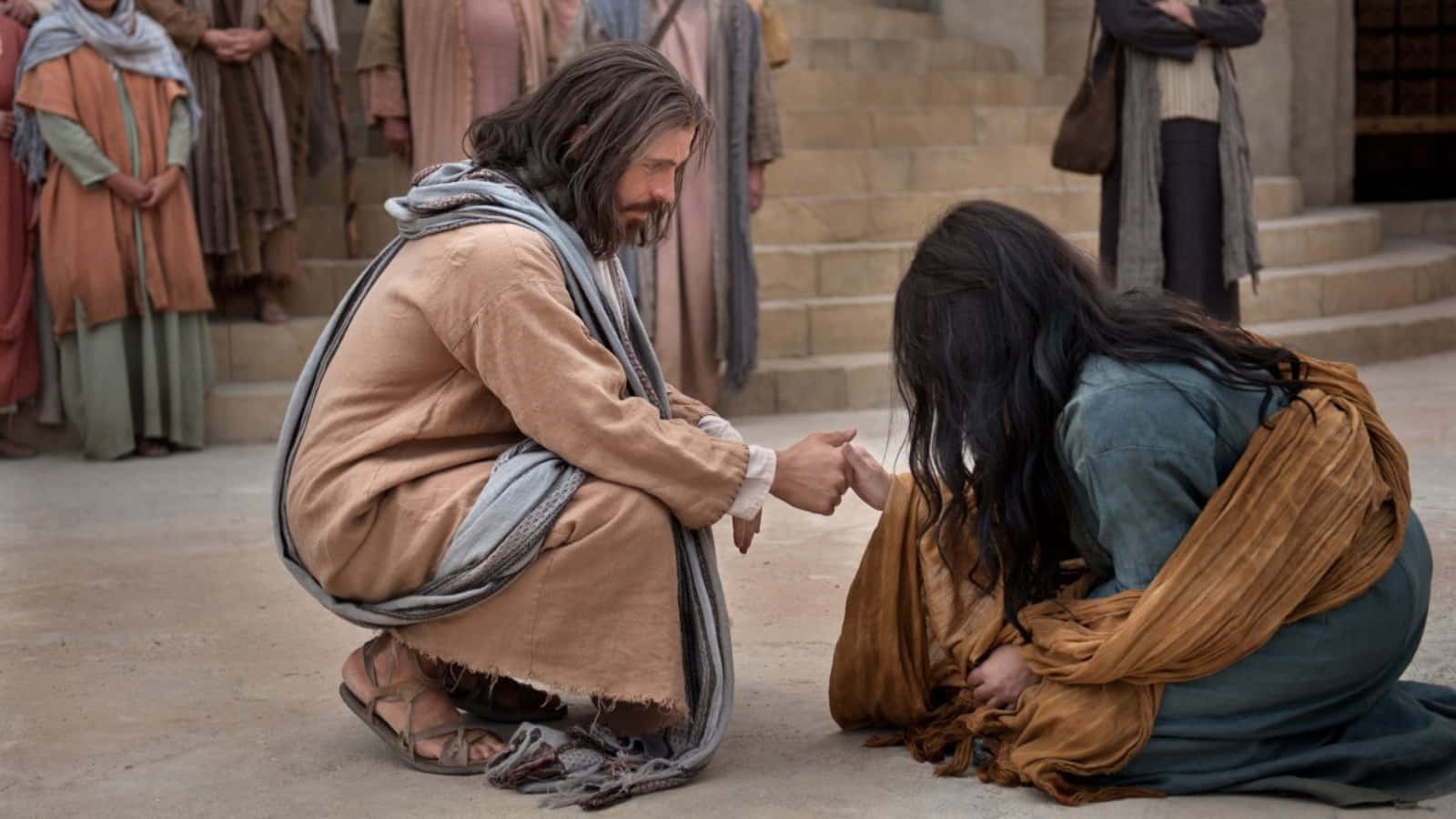 Jesus Kneeling Down To A Woman