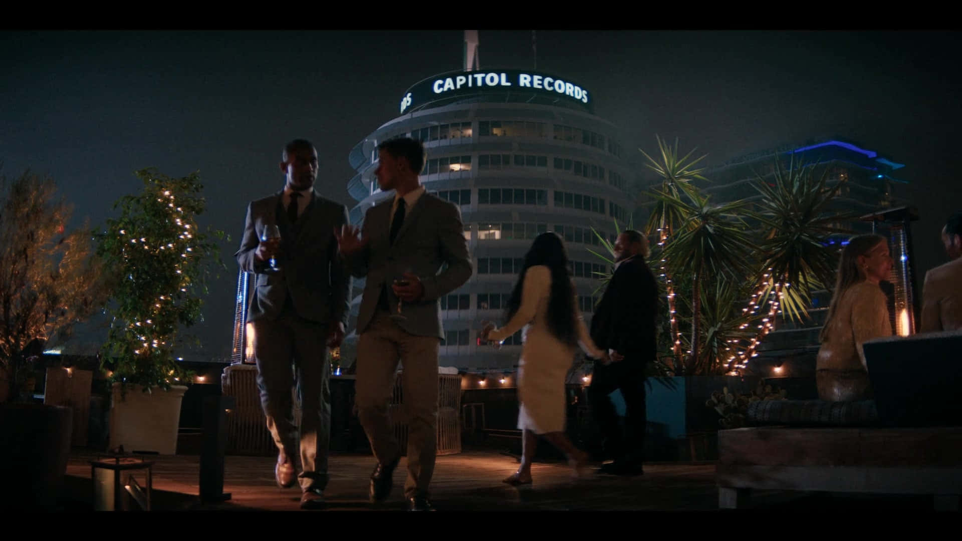 Formal People In Capitol Records Building Wallpaper