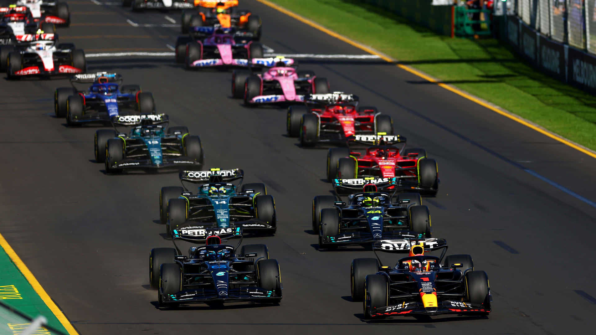 Formula1 Race Actionon Track Wallpaper