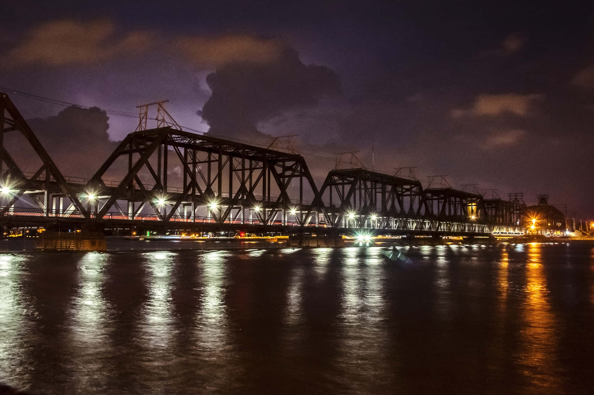 The Fort Madison Bridge Spans the Mississippi River Wallpaper