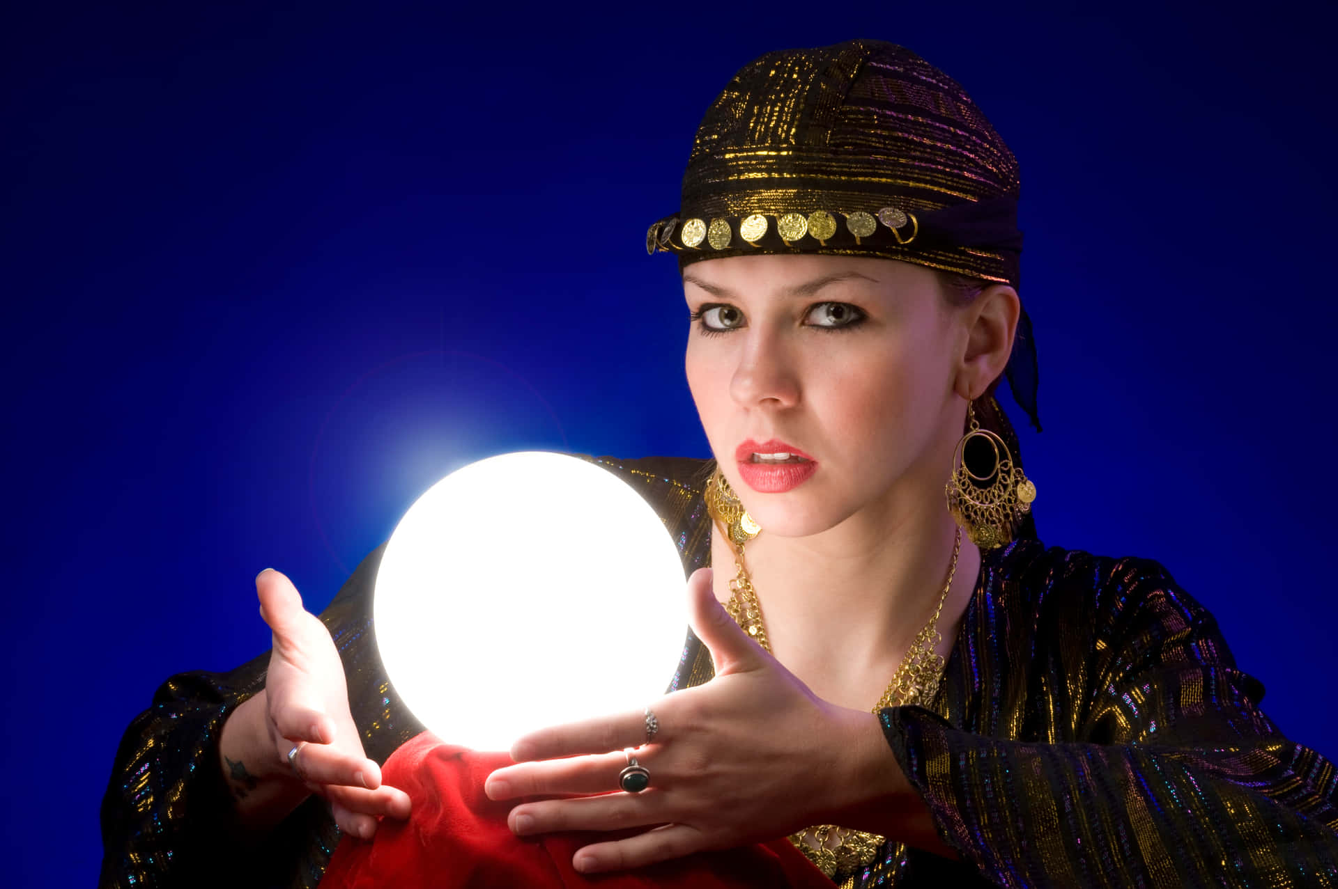 Mysterious Fortune Teller with Crystal Ball Wallpaper