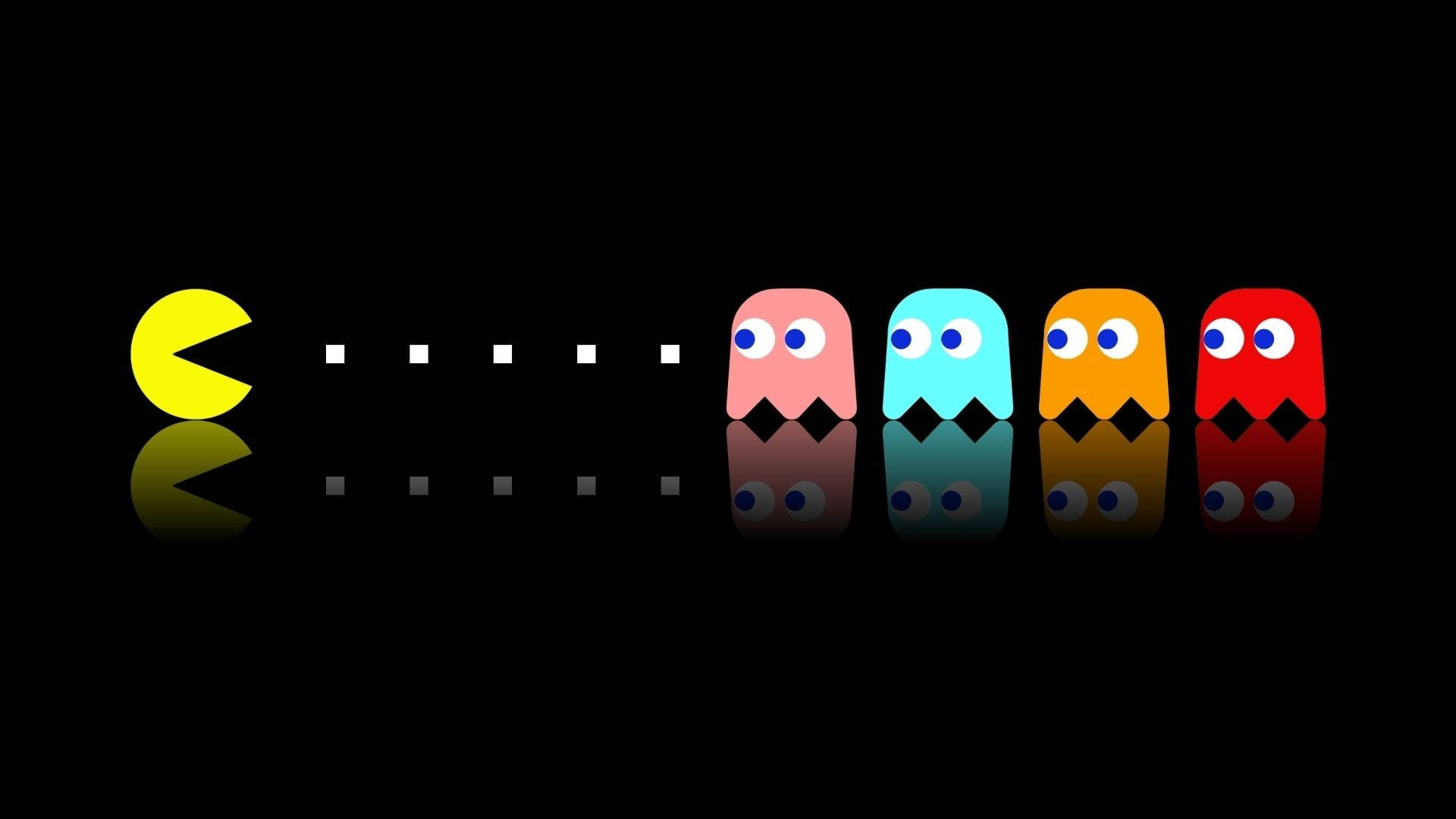 Four Ghost Waiting To Be Eaten By Pac Man Wallpaper
