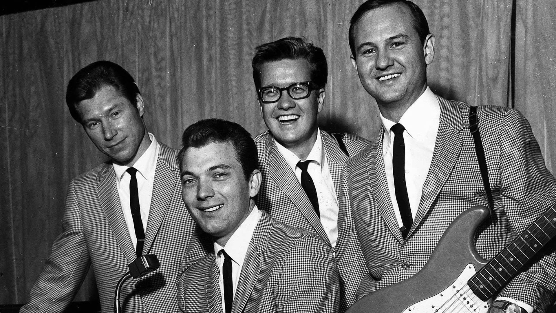 Four Male Artist Buddy Holly And The Crickets Wallpaper