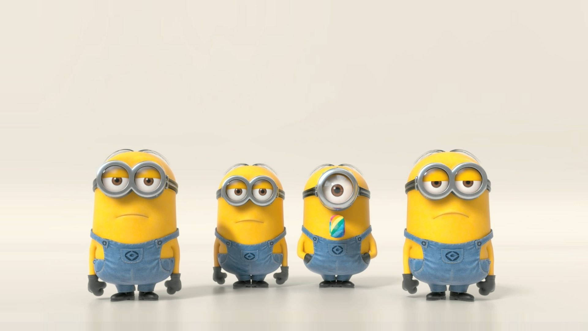 Download Four Serious Cute Minions Wallpaper 