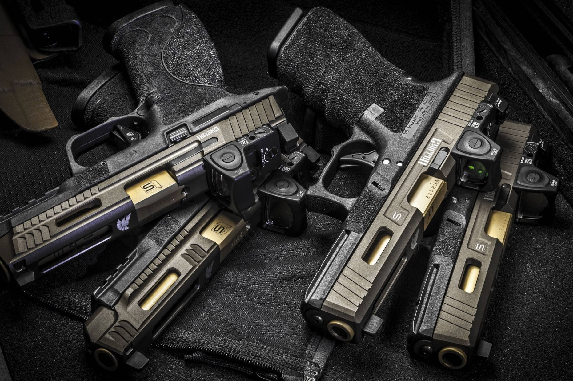 Four Tactical Glock Pistols Wallpaper