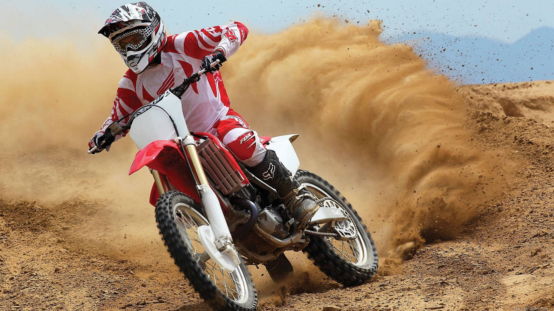 Get Ready to Ride in Style with Fox Dirt Bike Wallpaper