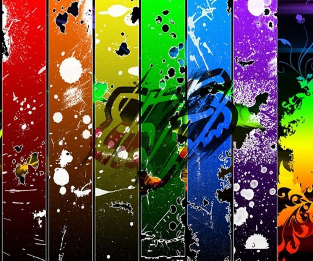 A Colorful Background With Paint Splatters Wallpaper