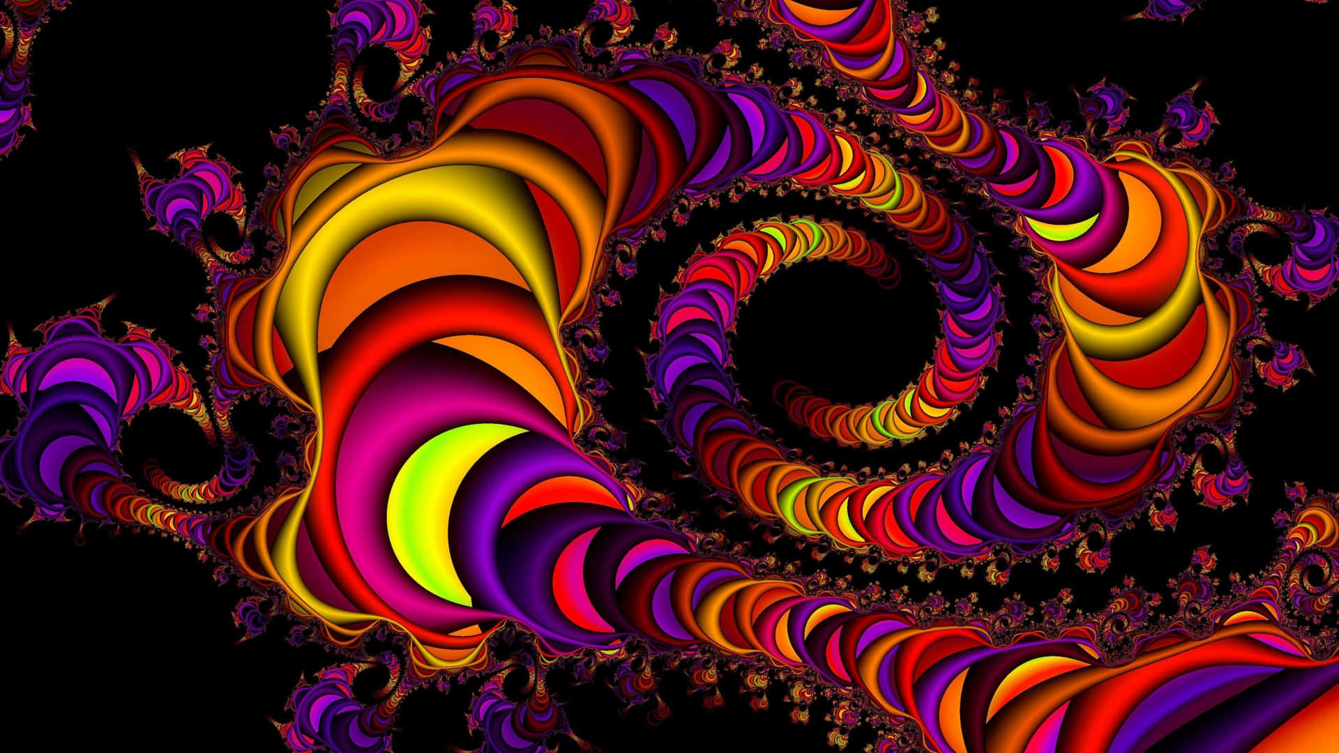 A kaleidoscope of color, featuring abstract fractal shapes Wallpaper