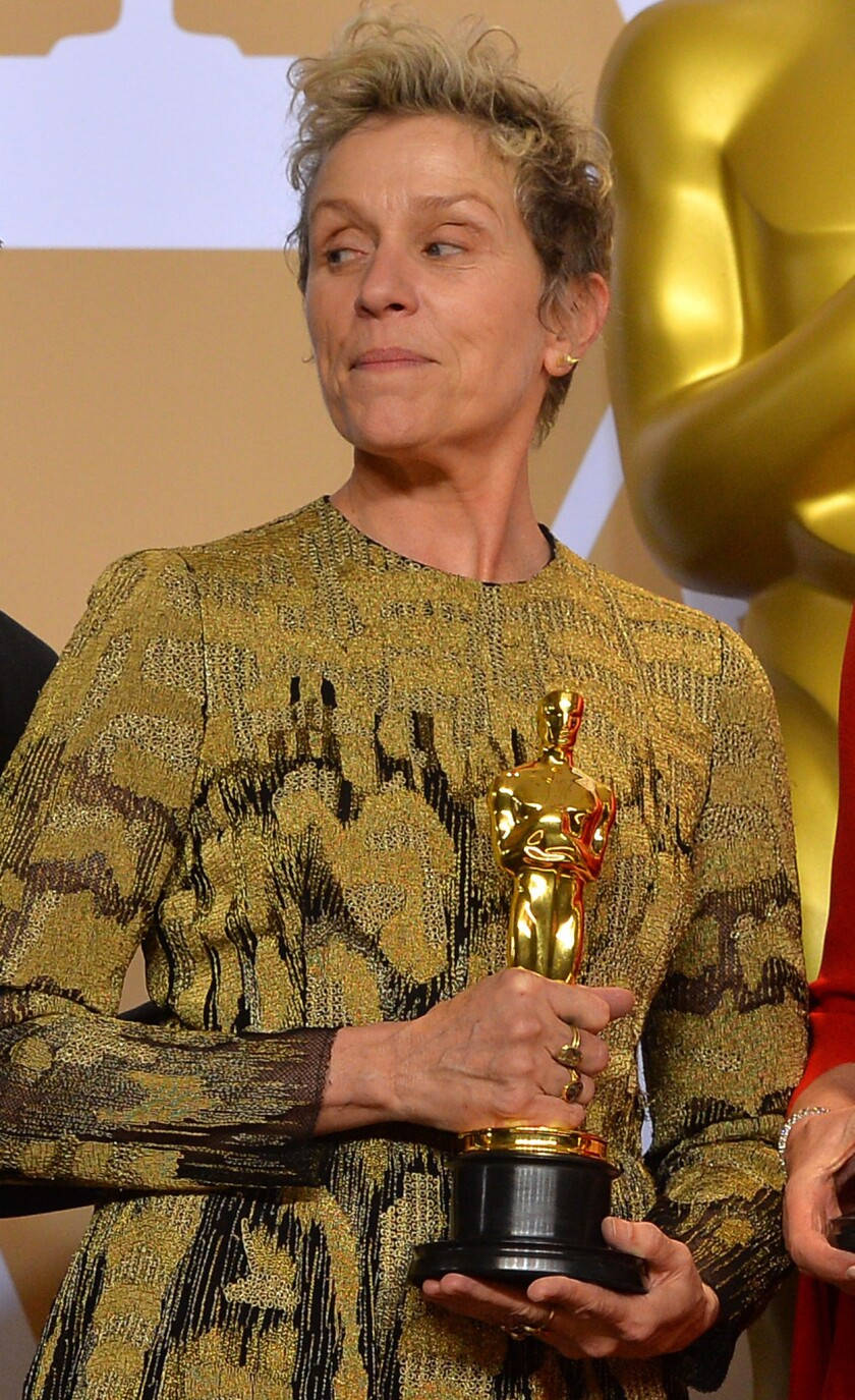 Caption: Frances McDormand Winning Best Actress at 90th Academy Awards Wallpaper