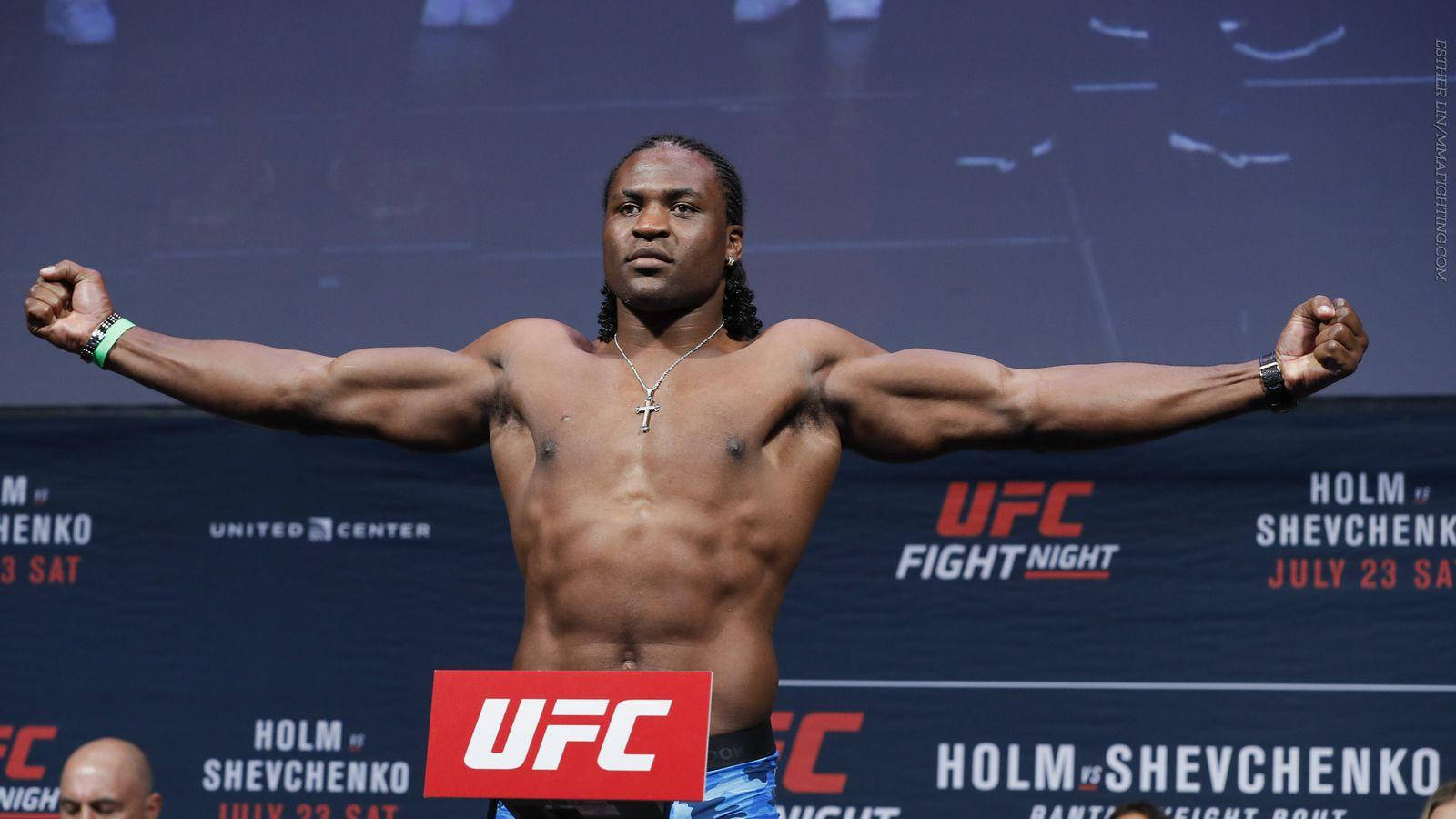 "Francis Ngannou Exhibiting His Powerful Physique" Wallpaper