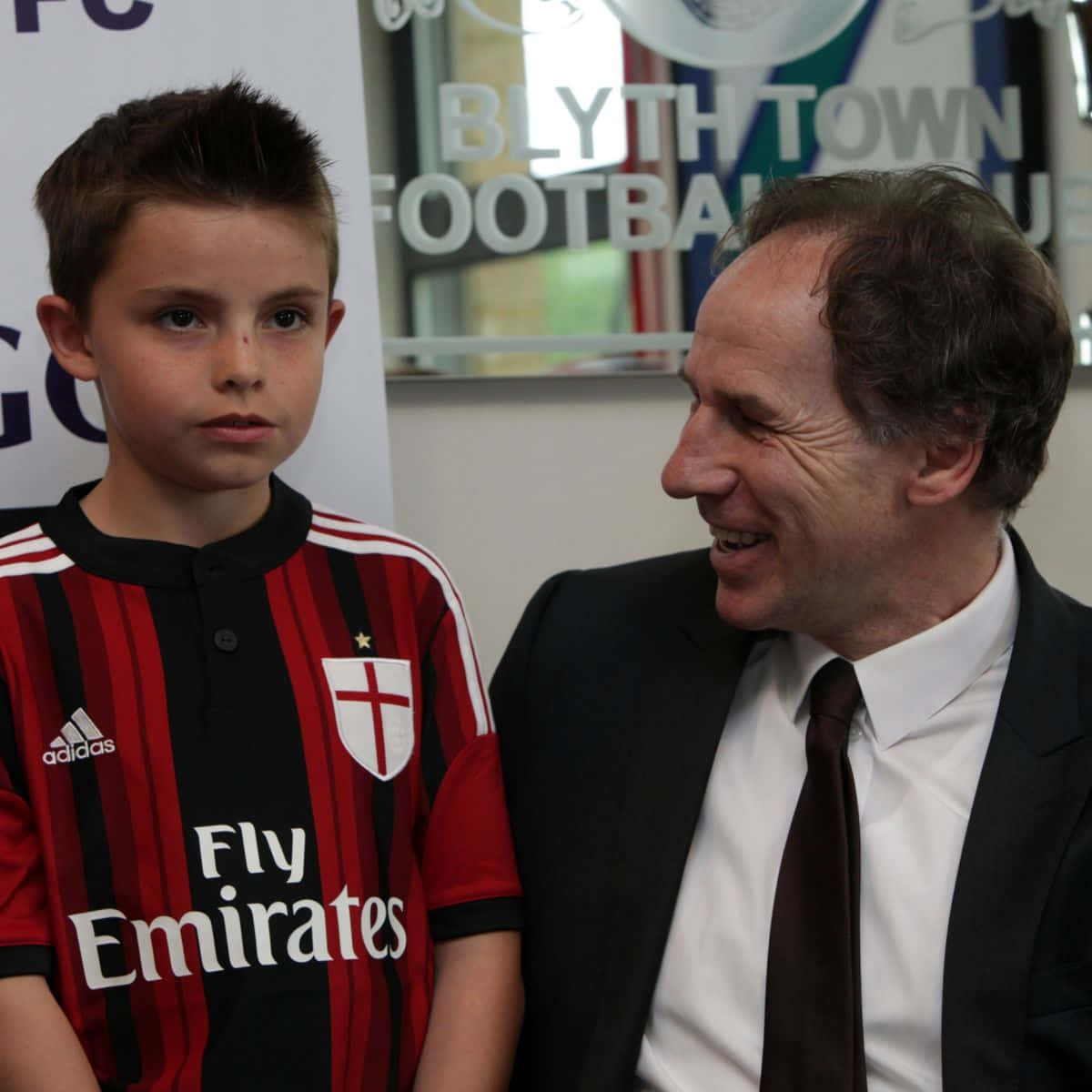 Franco Baresi With A Young Fan Wallpaper