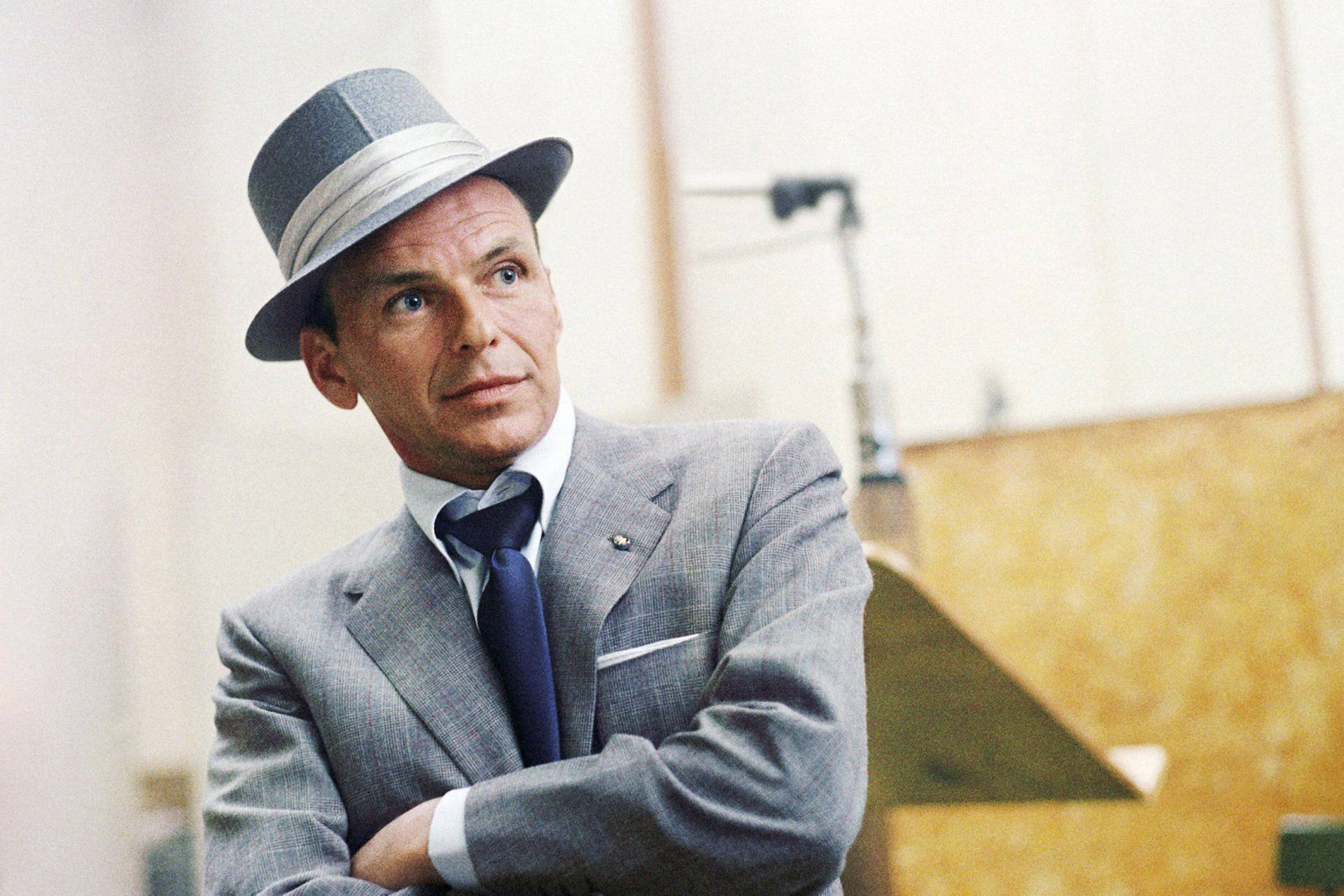 Frank Sinatra in a classical light-grey suit Wallpaper