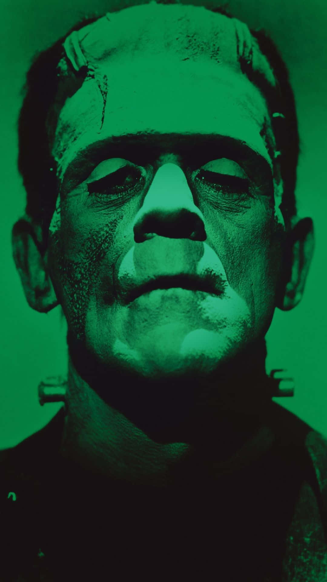 Frankenstein i grøn med en grøn baggrund