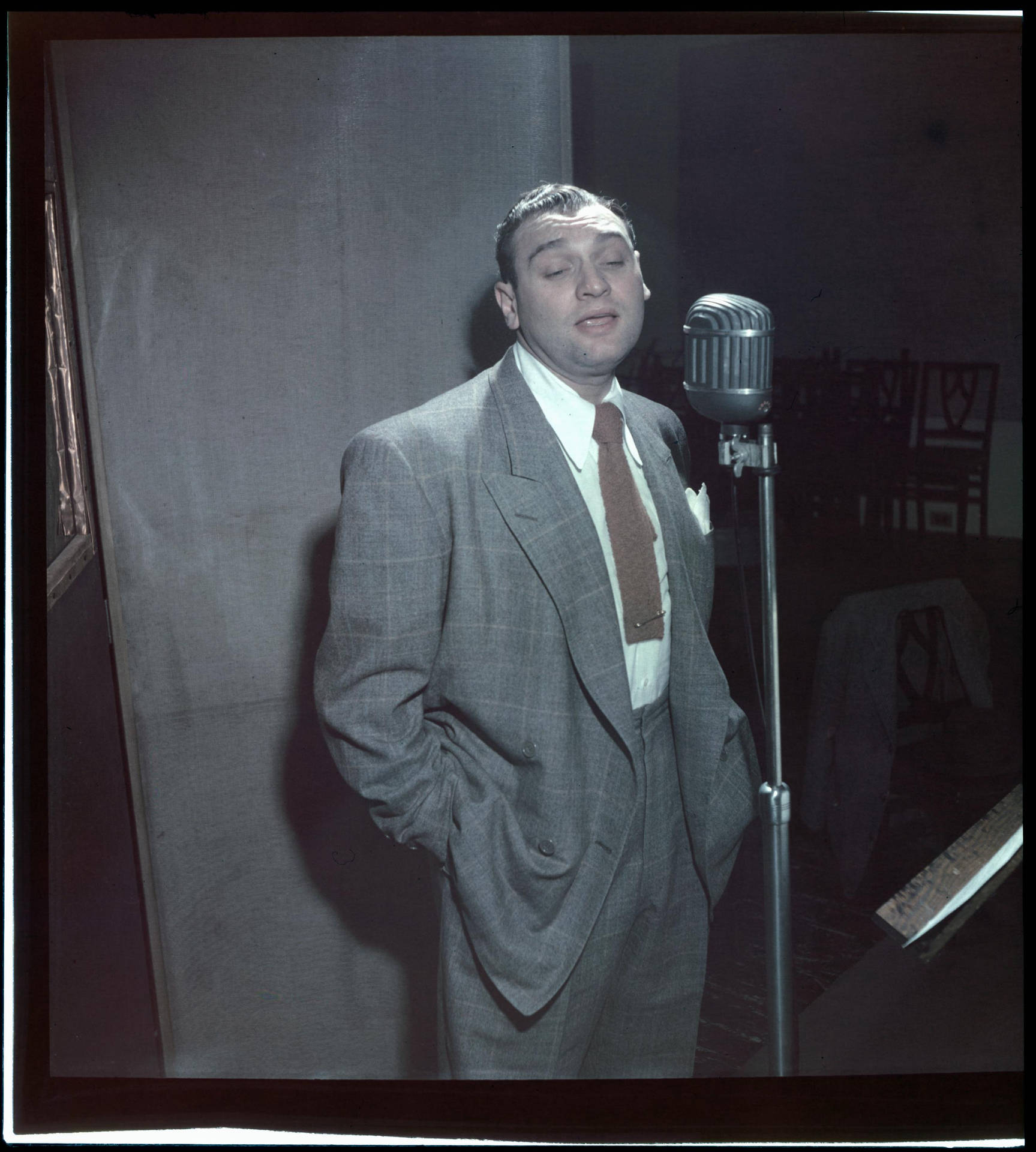 Frankie Laine Singing In A Studio Poster Wallpaper