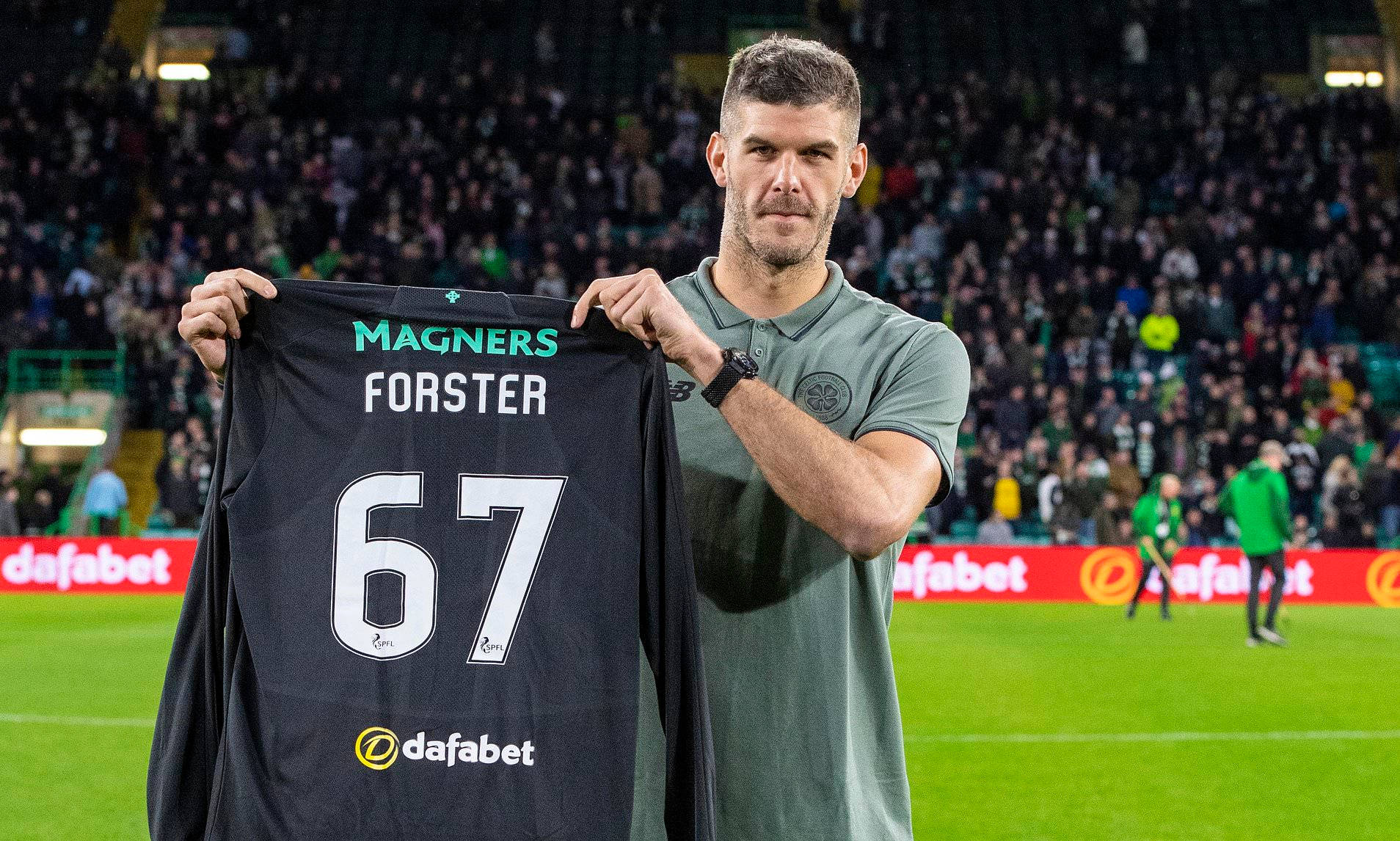 Fraser Forster Holding Black Sweater Wallpaper