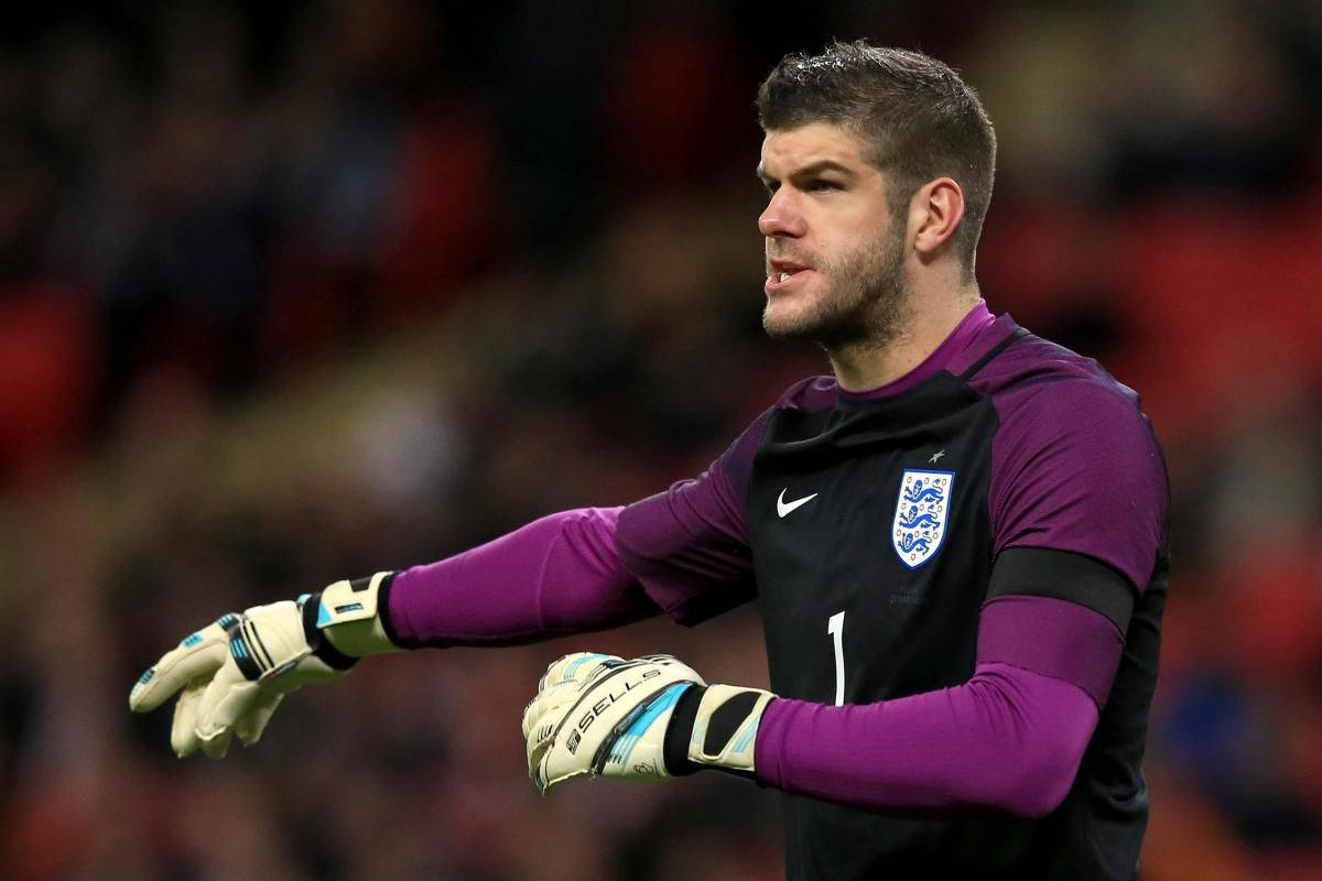 Fraser Forster Pointing To His Right Wallpaper
