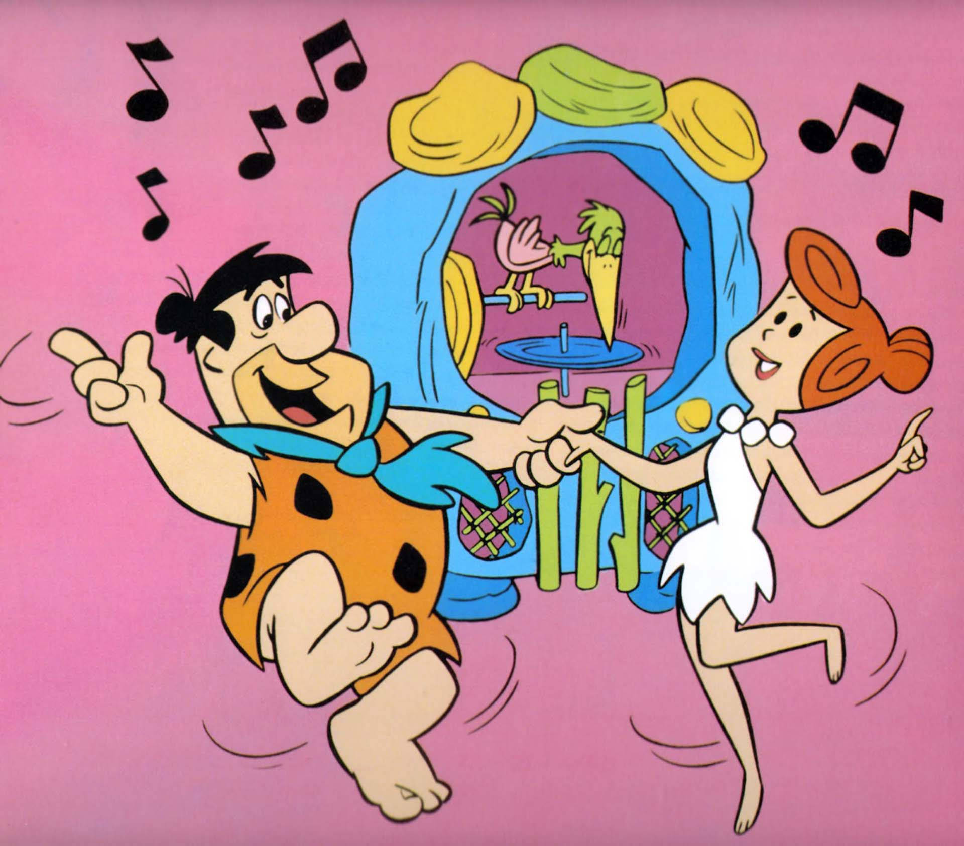 Se Fred Flintstone og Wilma Dance danse på skærmen. Wallpaper