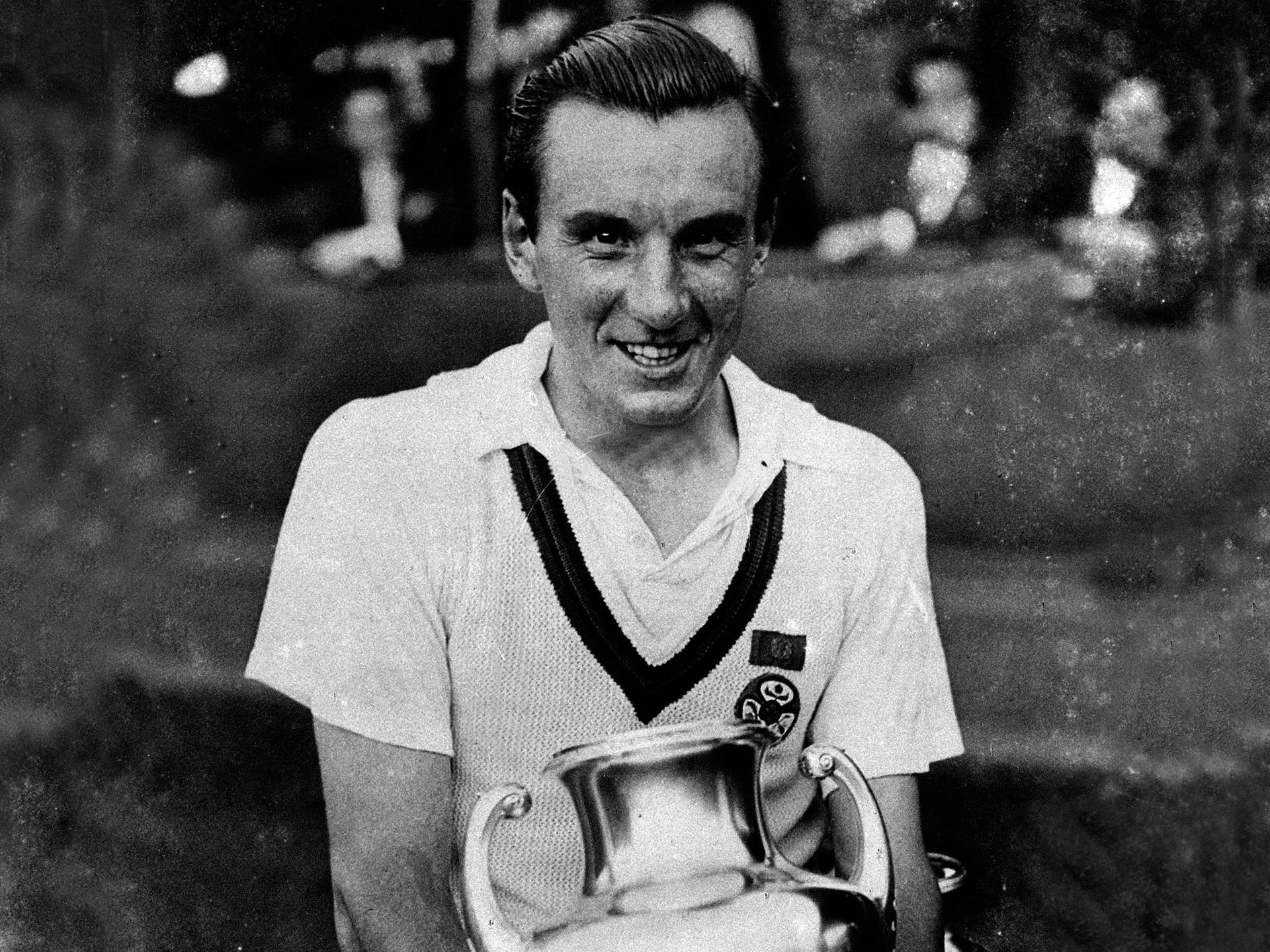 Fred Perry And His Trophy Wallpaper