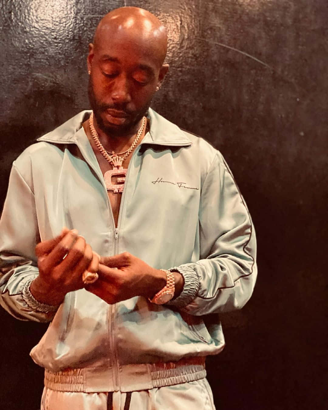 Freddie Gibbs Contemplative Pose Wallpaper