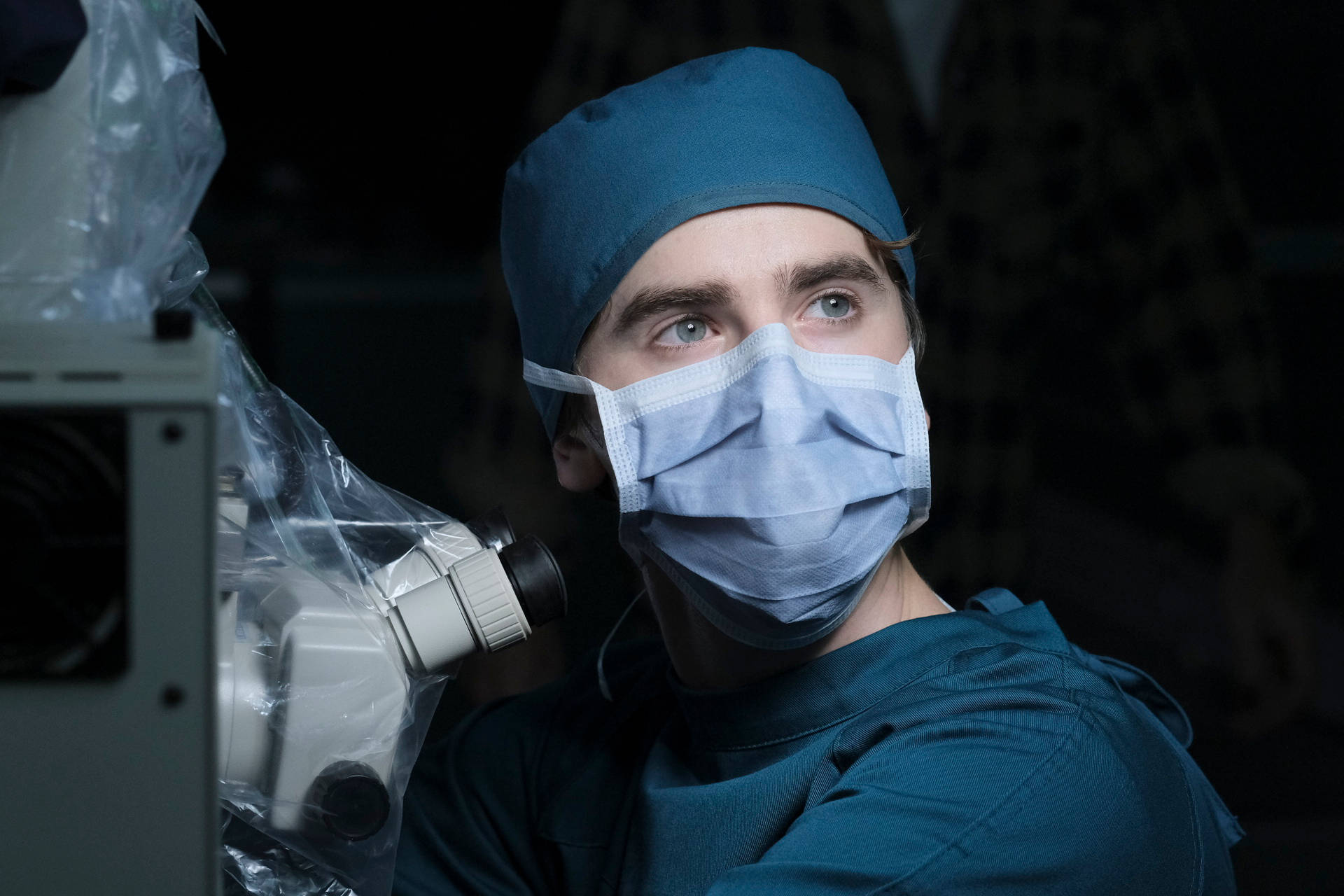 Freddie Highmore in a Surgical Outfit Wallpaper