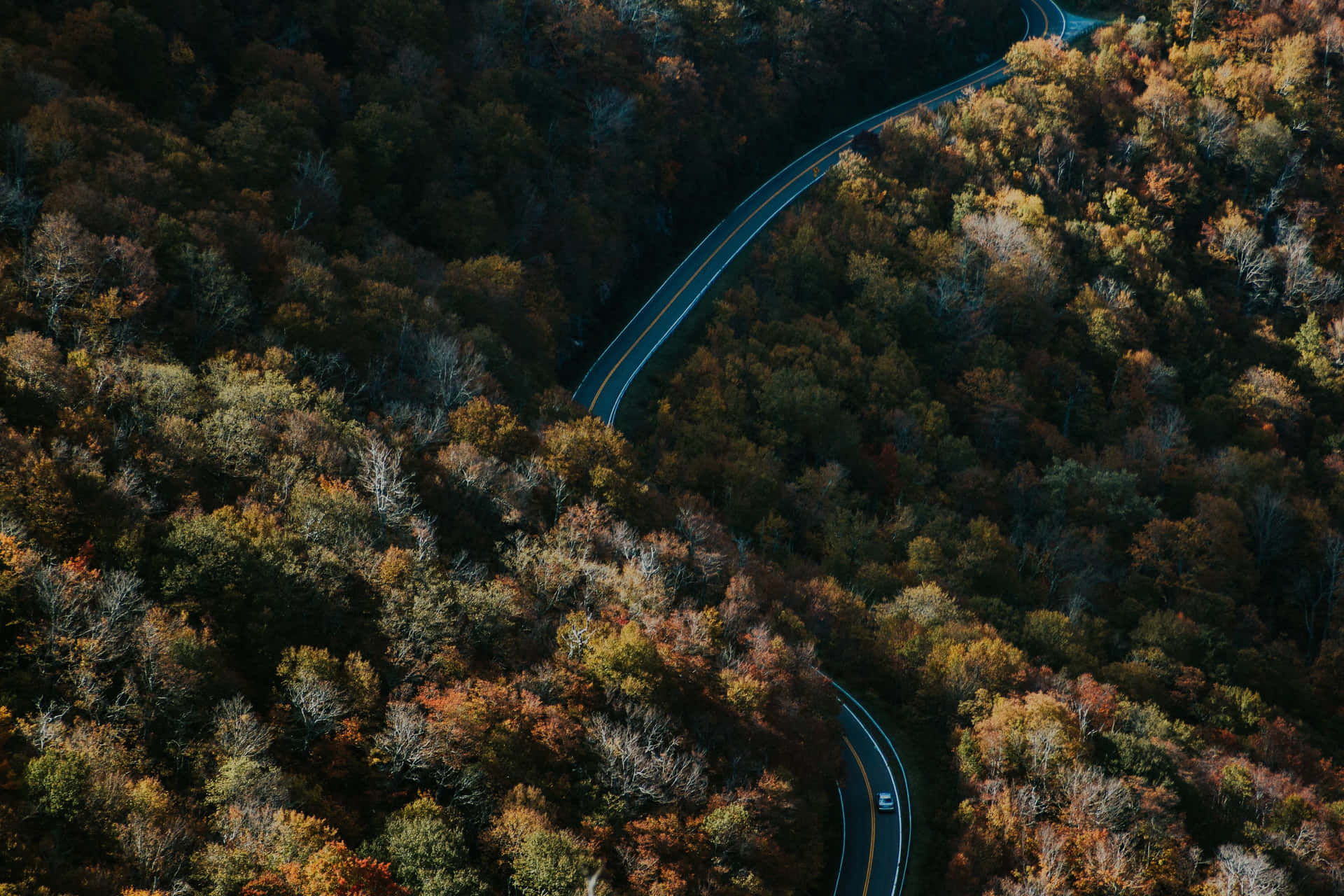 Aerial View Of A Winding Road In The Mountains