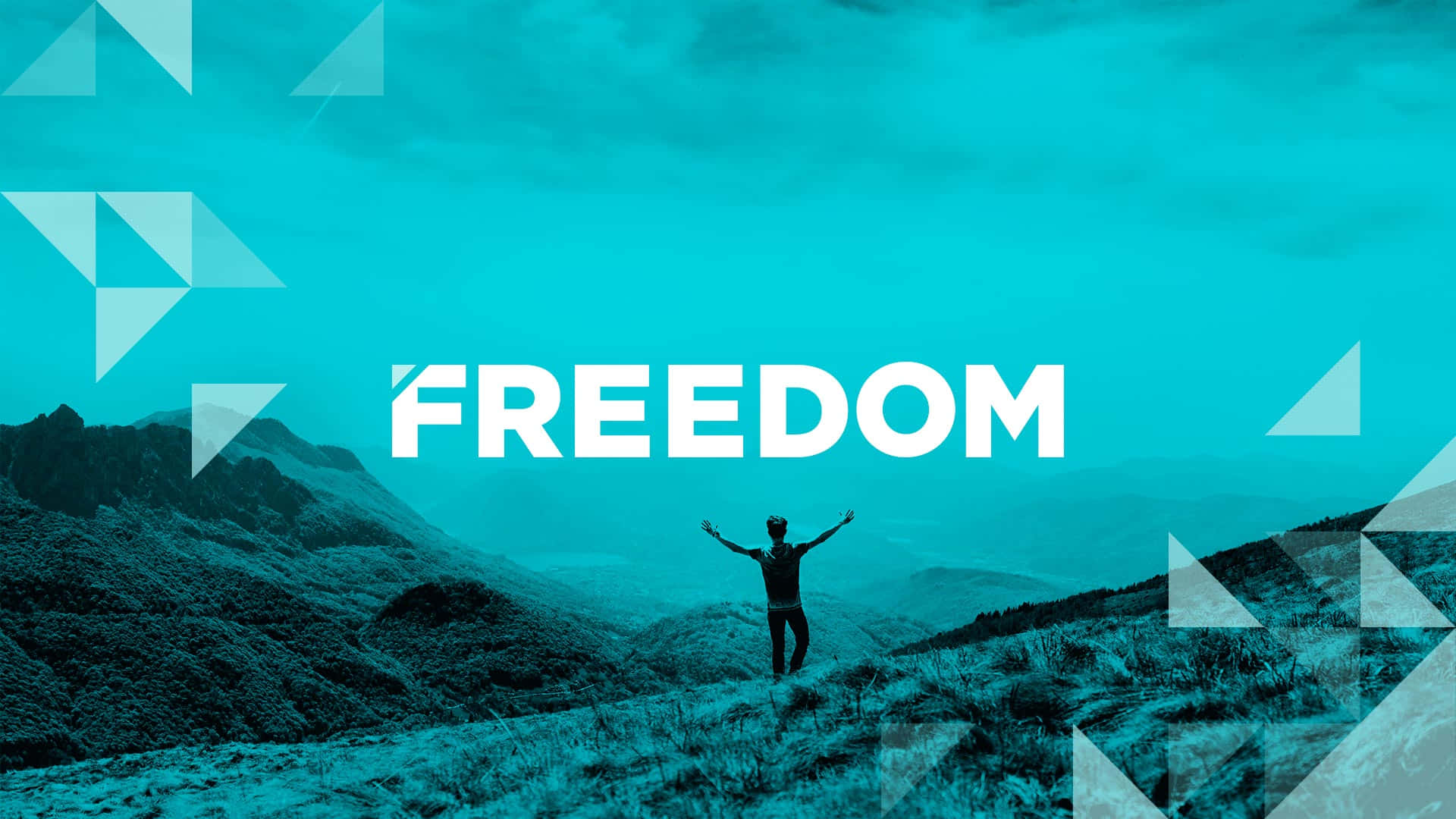 Freedom - A Man Standing On Top Of A Mountain